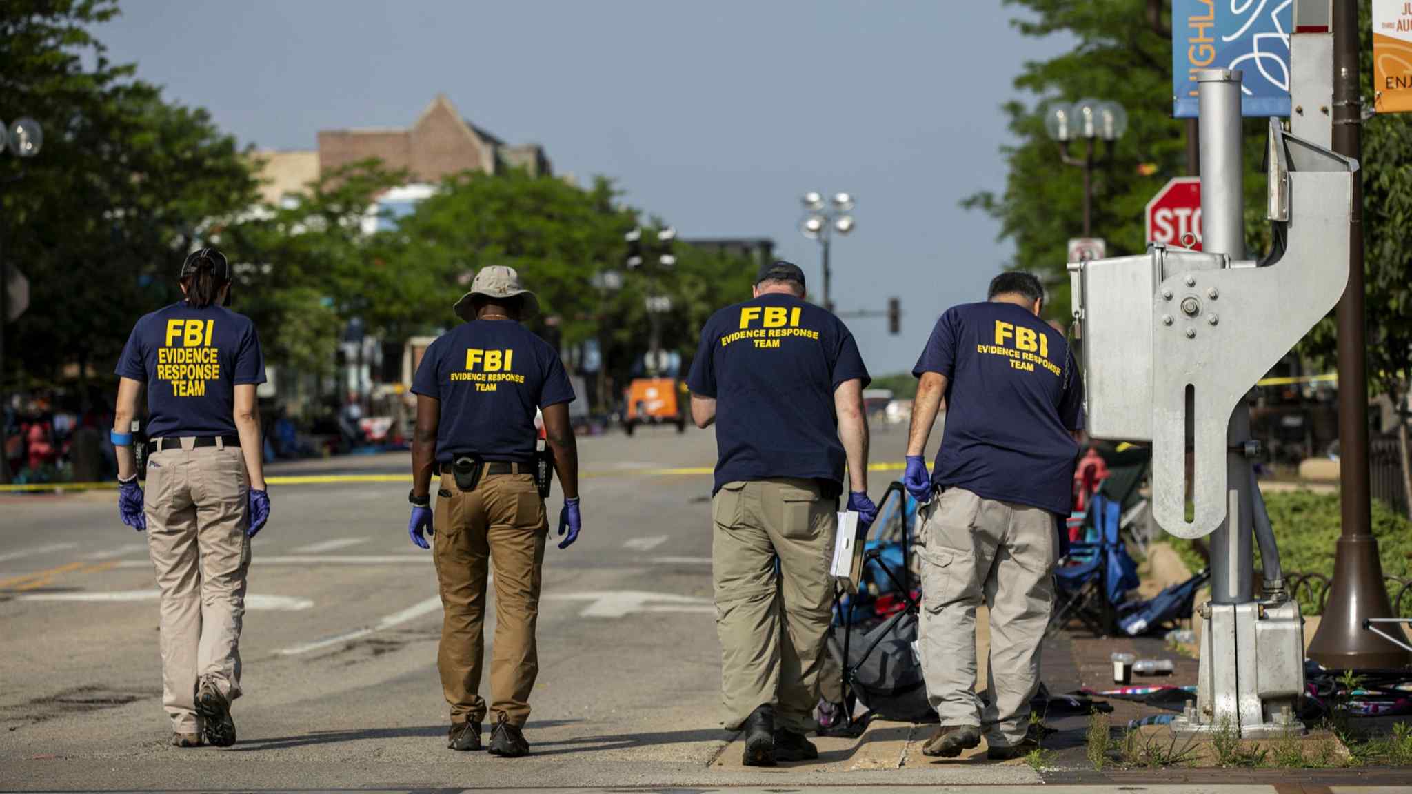 Suspect in Chicago suburb parade massacre charged with murder