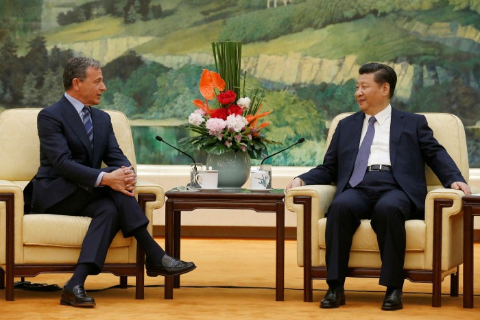 China’s president Xi Jinping, right, meets Bob Iger, then Disney chief executive, in 2016