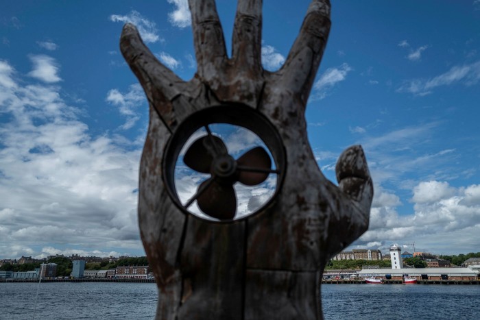 A statue stands at the mouth of the River Tyne. The river’s restoration is a symbol of what the region aspires to after the collapse in heavy industry across the North East from the 1970s