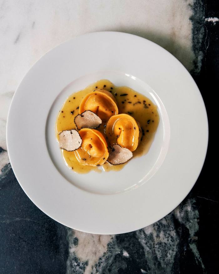 A plate of tortellini filled with ricotta, truffle and furikake at Angelina