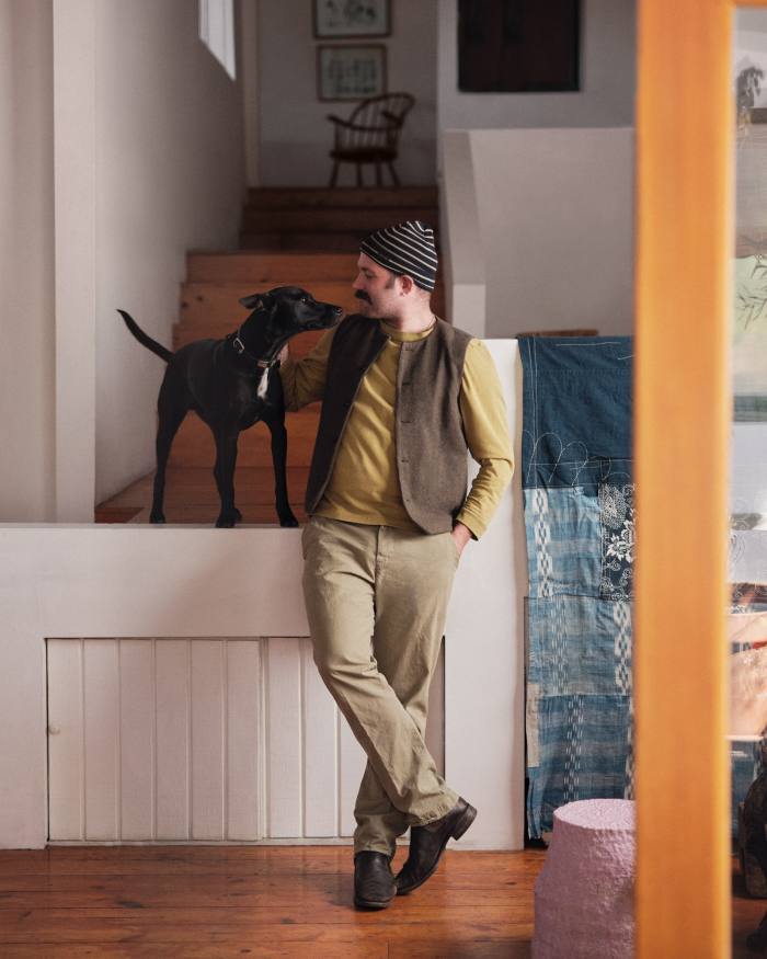 Alex Tieghi-Walker at home in LA with his dog Ivo