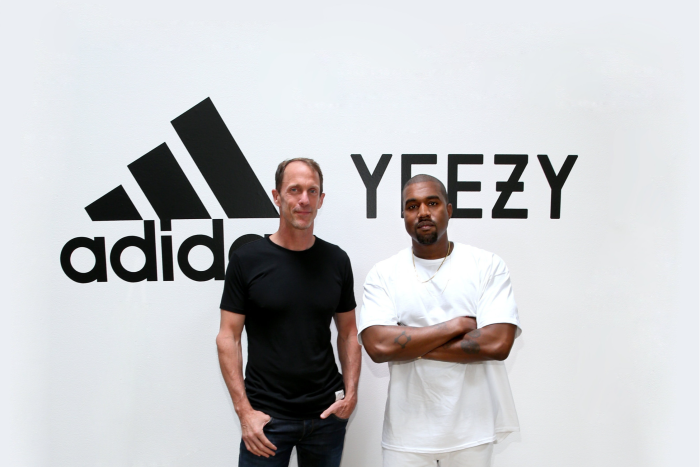 Adidas’s former chief of global brands Eric Liedtke, left, with Kanye West in 2016