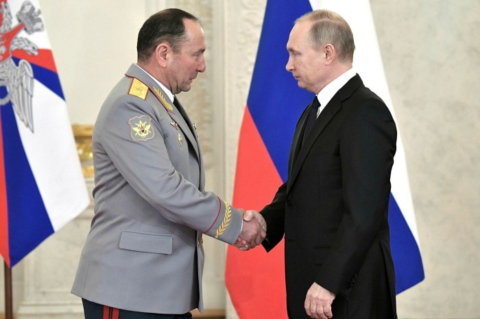 Russian president Vladimir Putin congratulates Major General Gennady Zhidko in 2017