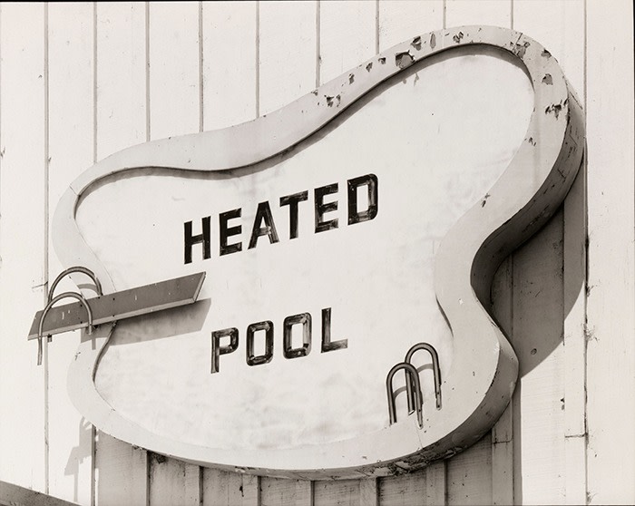 ‘Heated Pool’ sign at motel, US 99, Bakersfield, California, 1975