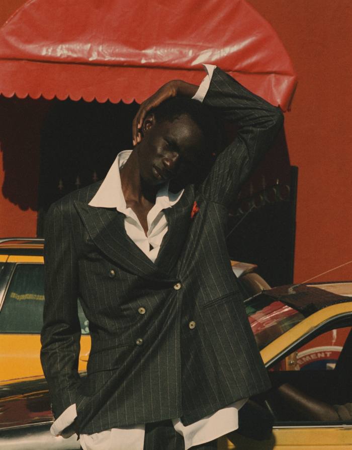 Malick Bodian wears The Row cotton poplin shirt, £910. Canali wool-cashmere suit jacket and trousers, £2,450