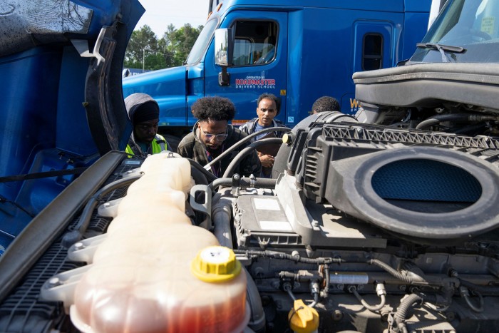 Students at Roadmasters Drivers School conduct a safety check as part of their training. The Georgia facility is poised to graduate about 600 students a year