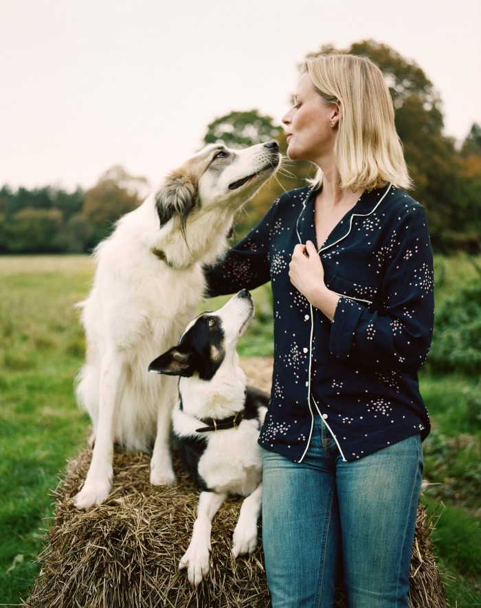 Perfumer Lucy Akhurst with her dogs Flossie (left) and Barney on the Highclere Estate