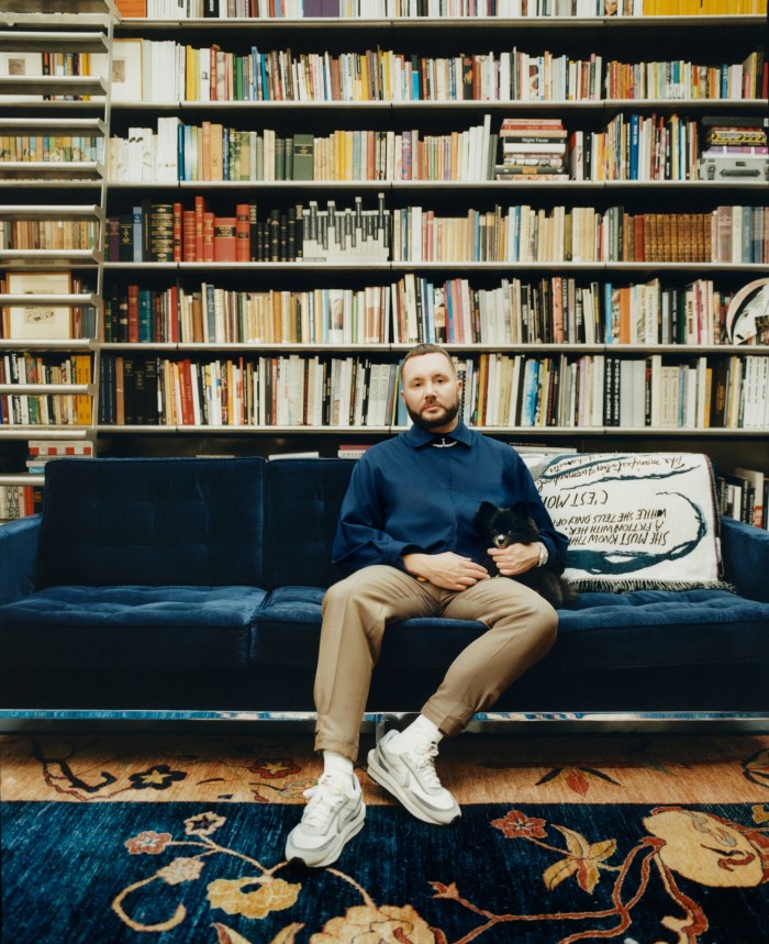 Kim Jones, artistic director of Dior Men, in his library at home