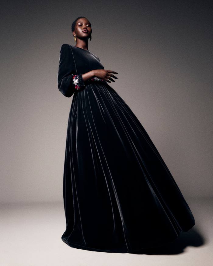 Model Adut Akech wears a Chanel gown