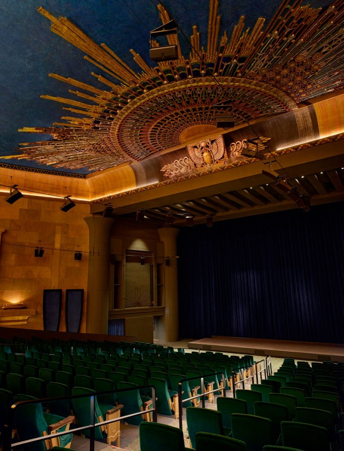 The highly decorated and ornate interior of a cinema/theatre