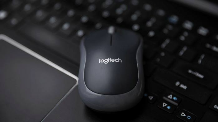 Logitech mouse on top of a keyboard