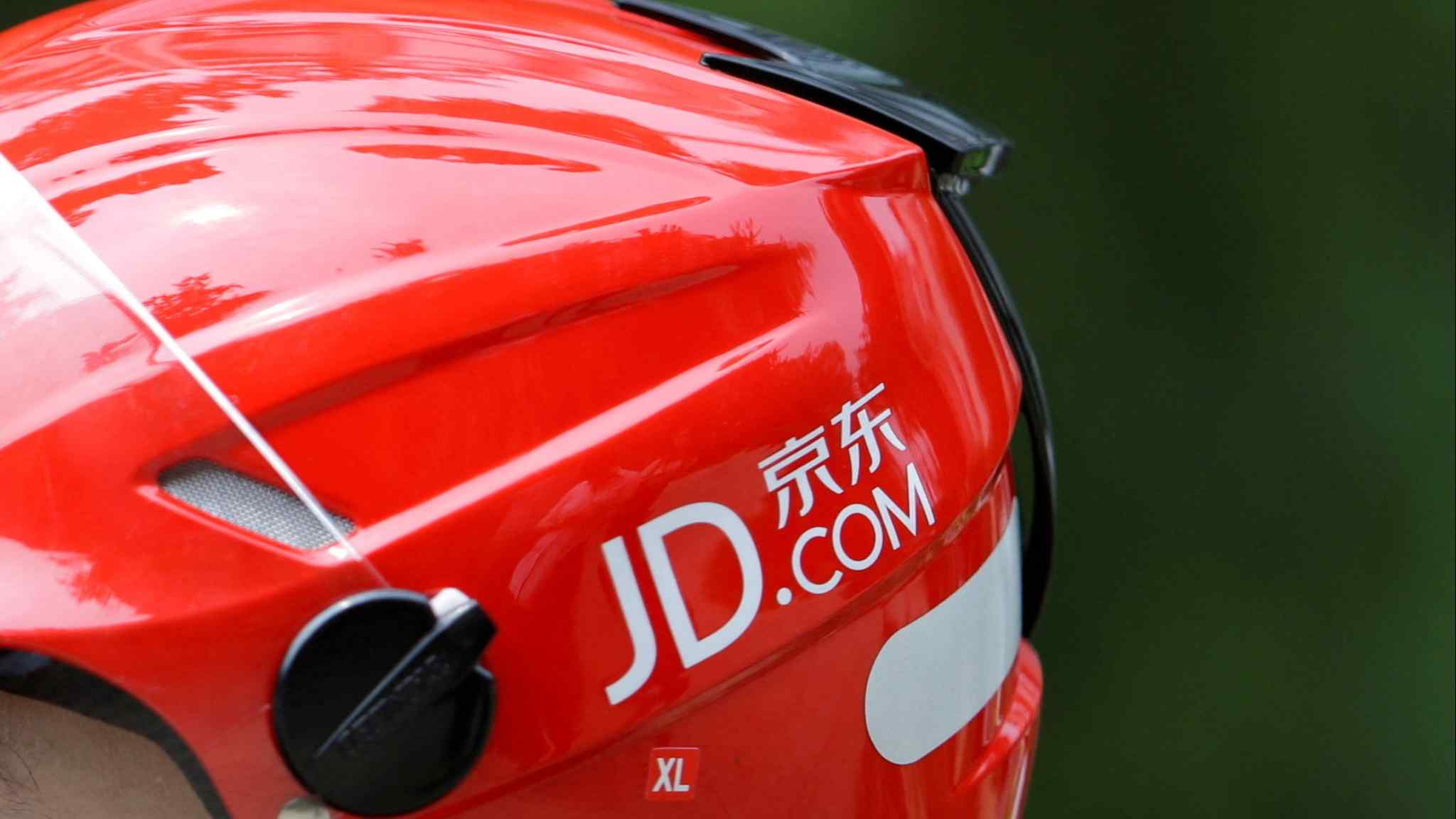 JD.com to slash pay for top staff as China growth slows