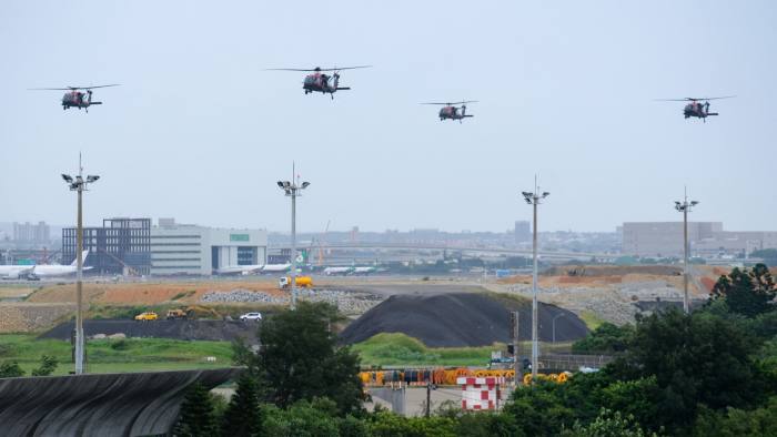 Four US made Black Hawk helicopters fly during the military Han Guang drill at the Taoyuan International Airport last week.