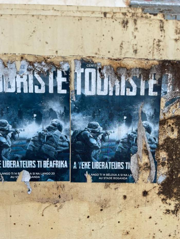 Faded film posters for the film ‘Touriste’ still hanging on the walls of the national stadium in Bangui, the capital of the Central African Republic 