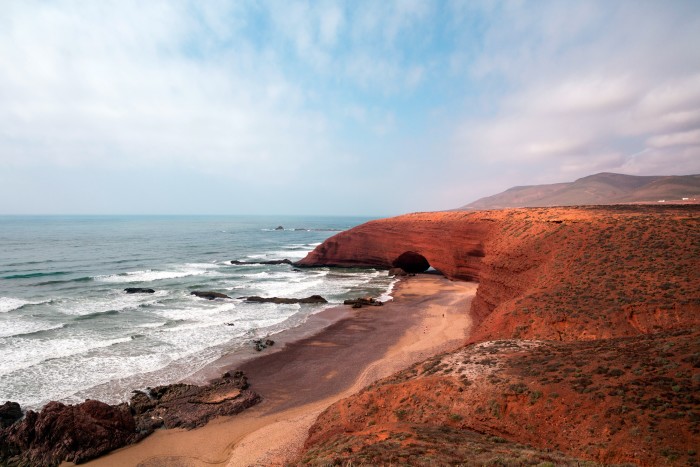 Arch on Regzira beach in southern Morocco
