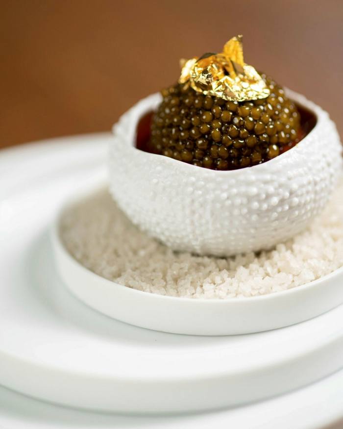 A dish of sea urchin with caviar and cauliflower at Amber
