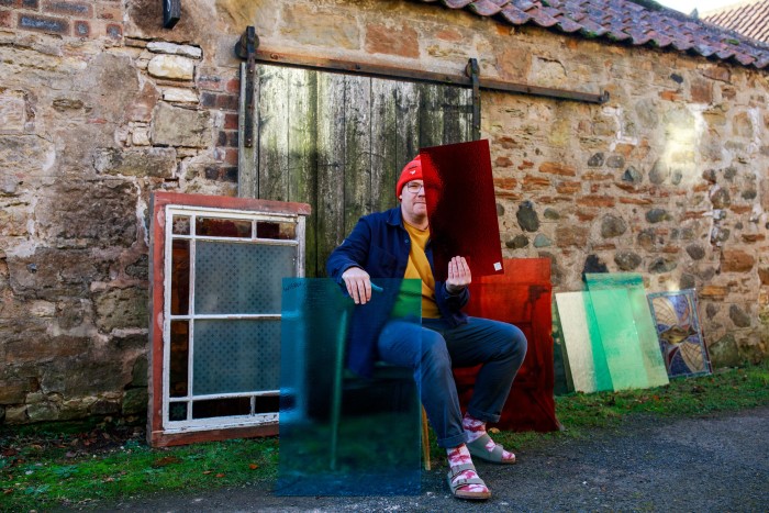 Keny Drew of East Neuk Glass, artist and stained-glass maker, outside his studio at Comielaw Farm