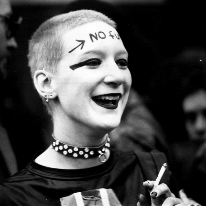 A girl wearing punk clothes and make up, including the words ‘No Future’ across her forehead, waiting outside the Rainbow Theatre, London, before a Jam and Clash gig. (Photo by Chris Moorhouse/Getty Images)