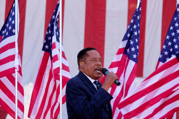 Larry Elder speaks to supporters during the Asia Rally for Recall at the Asian Garden Mall in Little Saigon, Westminster, California