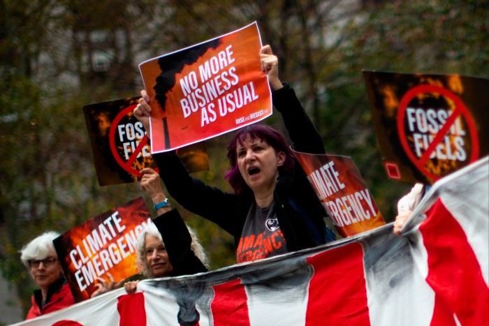 Activists in New York protest against fossil fuels