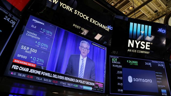 Federal Reserve chair Jay Powell delivers remarks on a screen at the New York Stock Exchange