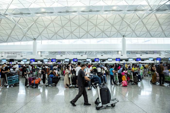 Passengers inside the Hong Kong International Airport