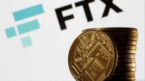 FTX logo and a token
