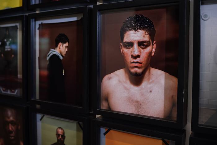 portraits of UFC fighters on the walls of his apartment-sized office in Las Vegas, which also features a gym, a walk-in wardrobe and a bar