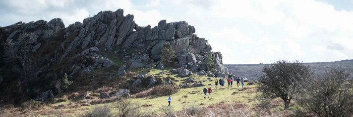 Laura Noonan's running group passes Greator Rocks on Dartmoor
