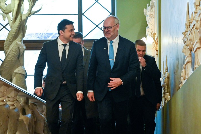 Ukrainian president Volodymyr Zelenskyy, and Estonian president Alar Karis walk together prior to their talks in Kyiv, Ukraine on Feb. 22