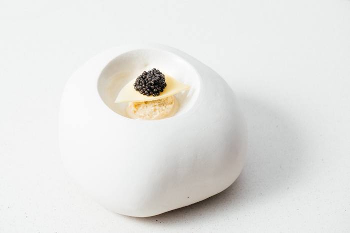 The caviar course at Esmé in Chicago with a sweet potato, kombu and bonito ice cream