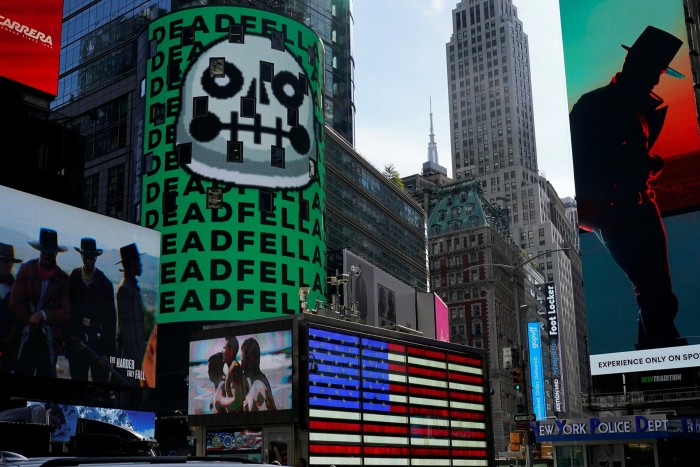 Une promotion NFT affichée sur un panneau d'affichage à Time Square, New York