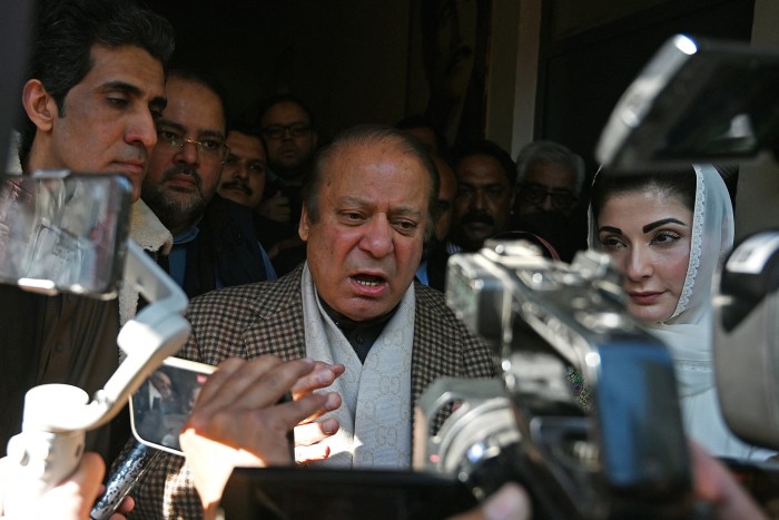 Pakistan’s three-time former prime minister Nawaz Sharif speaks to reporters after casting his ballot in Lahore on Thursday