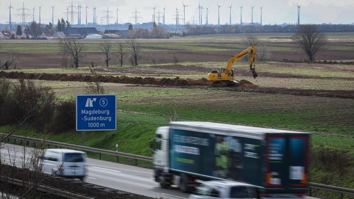 Cars drive on a road near Magdeburg, Germany