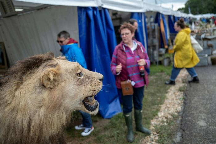 Bargaining customers at the Ardingly Antiques Fair in West Sussex