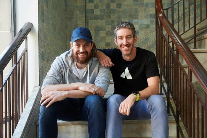 Mike Cannon-Brookes, left, and fellow founder of Atlassian, Scott Farquhar in their Sydney offices