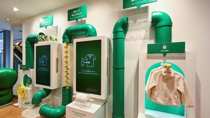 A display at a Uniqlo’s store in Tokyo’s Ginza shopping district shows how clothing is made from recycled plastic bottles