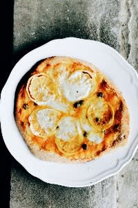 Sourdough mozzarella, lemon and caper pizza from the wood-fired oven