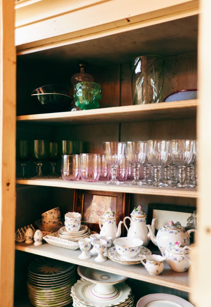 Her china cupboard, with glasses from Nason Moretti, The New Craftsmen, Guinevere Antiques . . . 