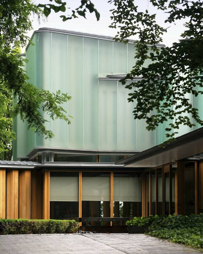 Integral House's glass-green exterior