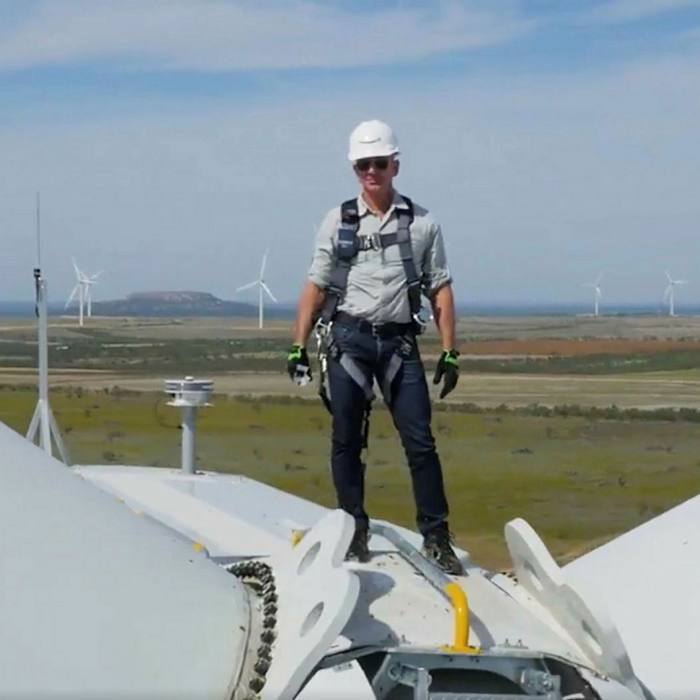 CEO Jeff Bezos on top of a wind turbine at the 253MW Amazon Wind Farm Texas. The tech group was the largest corporate clean energy dealmaker in the US last year