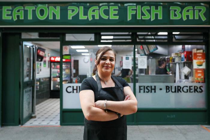 Elena Georgiou, standing in front of her Eaton Place Fish Bar