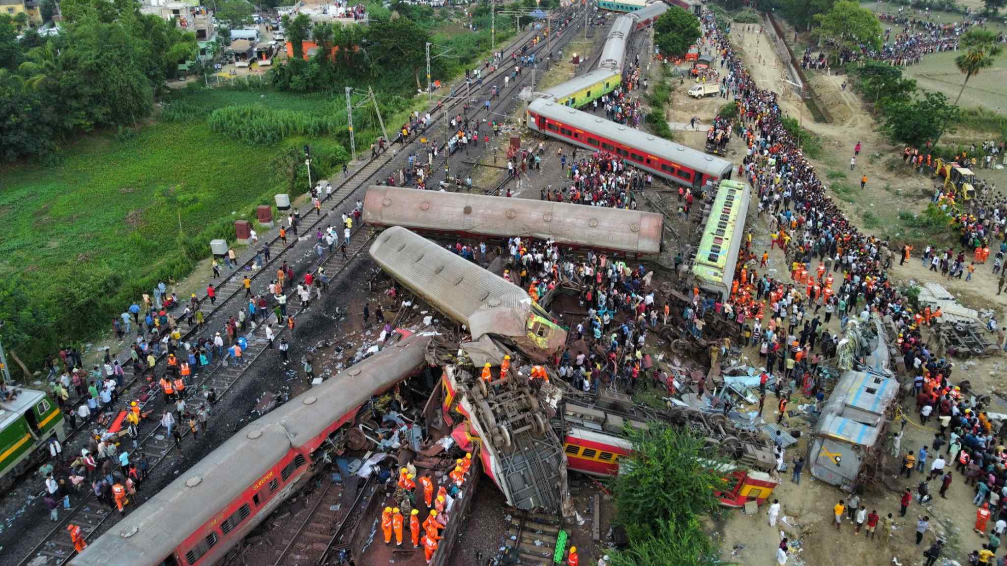 India blames train crash on signal failure as death toll nears 300