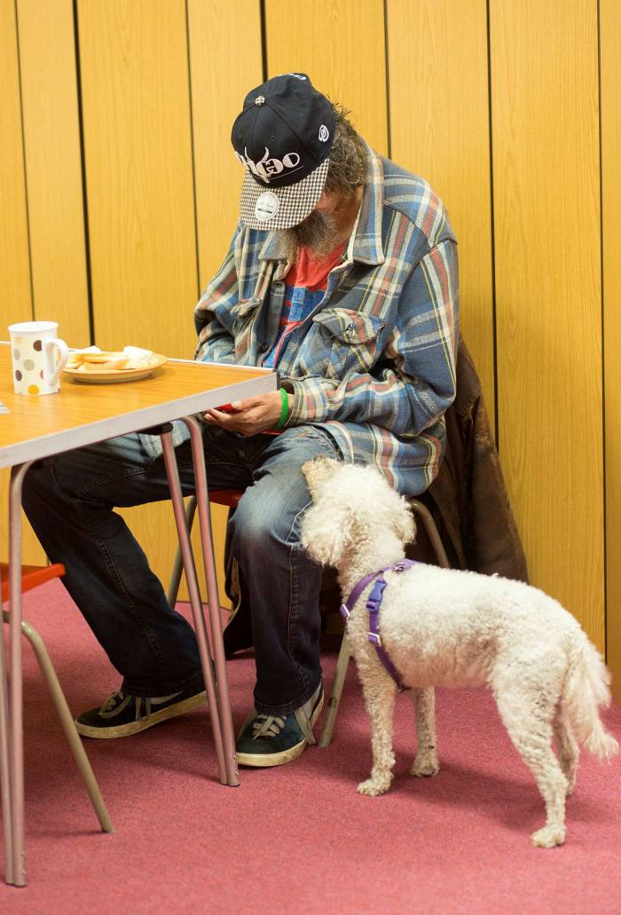 A visitor has tea at the Salvation Army in Redruth, Cornwall