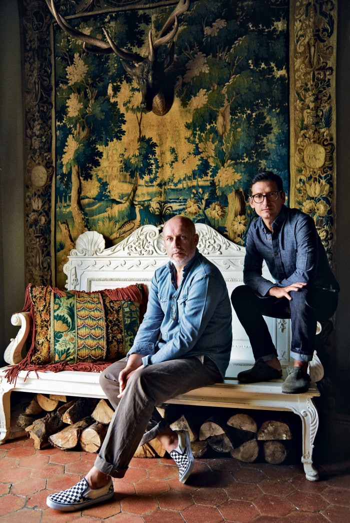 Peter Copping (left) and his husband, Rambert Rigaud, in the entrance hall of La Carlière. La Carlière Vita cushion, £1,350