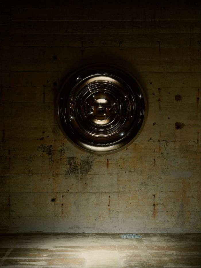 A steel circle on a wall