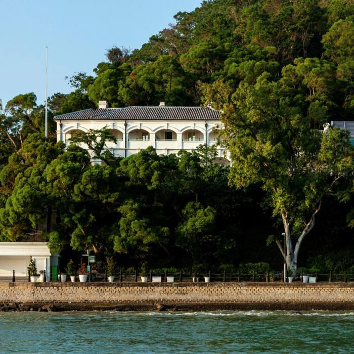 The Heritage Hotel is perched on a tree-covered hillside in the old fishing village of Tai O on Lantau Island 