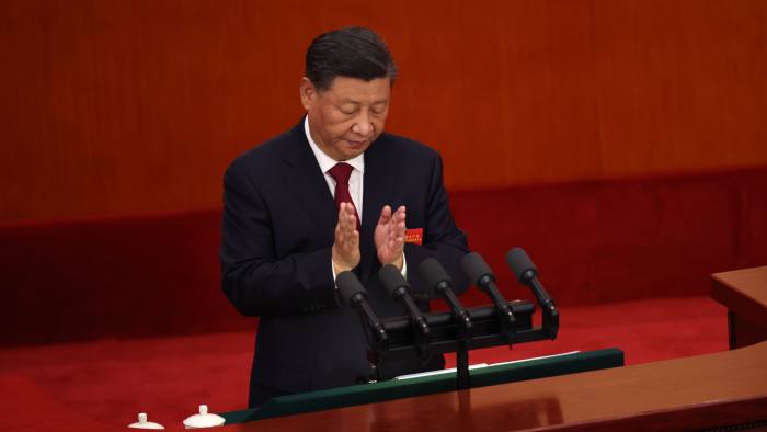 Xi Jinping applauds during the opening ceremony of the Chinese Communist Party’s 20th Congress in Beijing’s Great Hall of the People