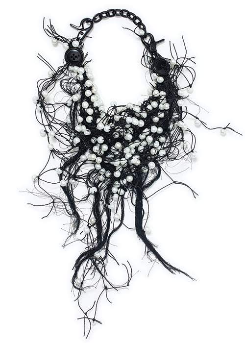 Black string and pearls Judy Blame necklace. Isaac Murai-Rolfe/GQ style