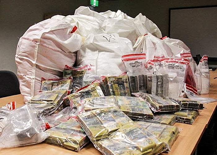 Australian police display drugs and cash seized from crime syndicates